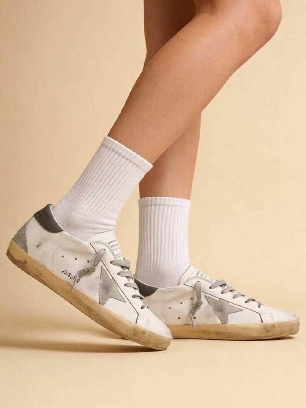 Trendy Golden White Sneakers with Gray Star and Tan Sole